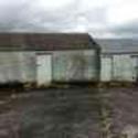 Building site/agricultural land with existing bungalow/outhouses in need of repair 